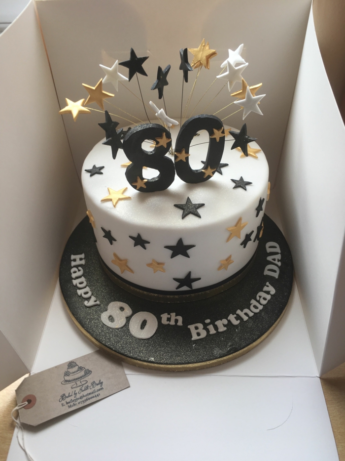 one tier cake, covered with white fondant, happy 80th birthday, decorated with black and gold stars