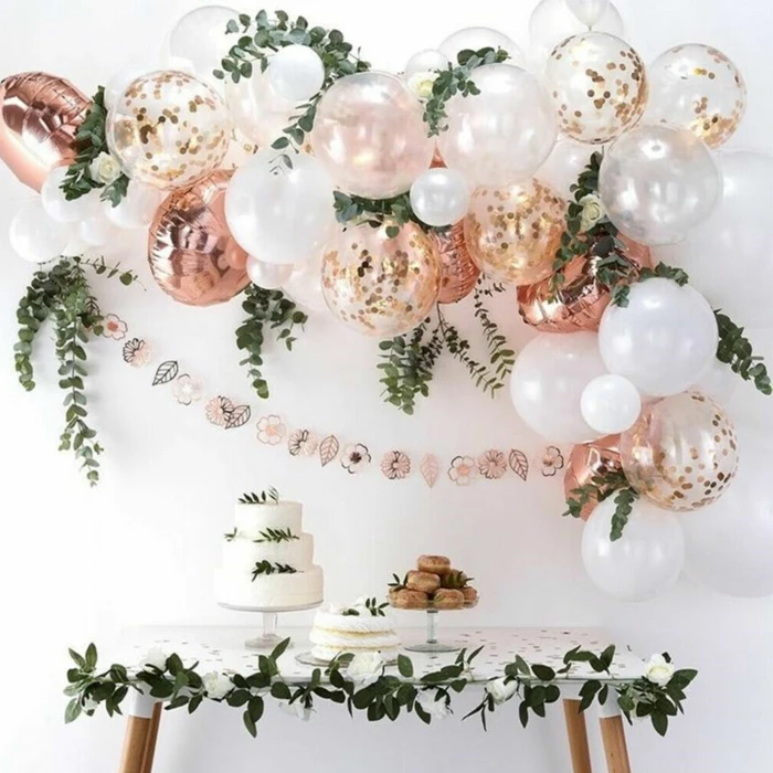 white and rose gold ballons, hanging over desserts table, 18th birthday gifts, three tier cake