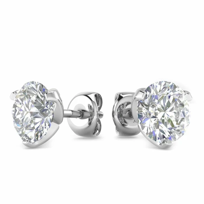 diamon stud earrings, placed on white surface, anniversary gifts for couples