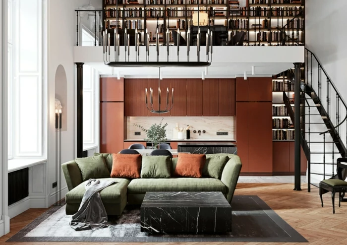 two storey open space apartment, kitchen living room and reading room, green corner sofa, large bookshelves