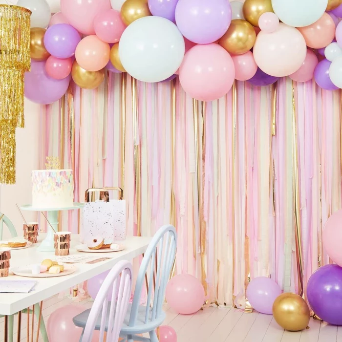purple pink and gold balloons, hanging over table, 18th birthday gift ideas, cake on the table and plate settings