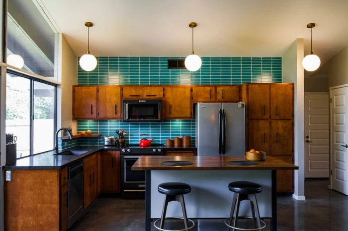 blue subway tiles backsplash, wooden cabinets with black countertops, modular kitchen cabinets