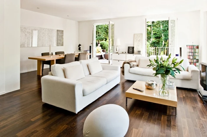 white sofa, dark wooden floor, beautiful living room ideas, wooden coffee table, open plan dining room and living room
