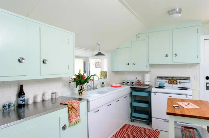 light blue pastel cabinets, small kitchen island with wooden countertop, modern kitchen cabinets colors