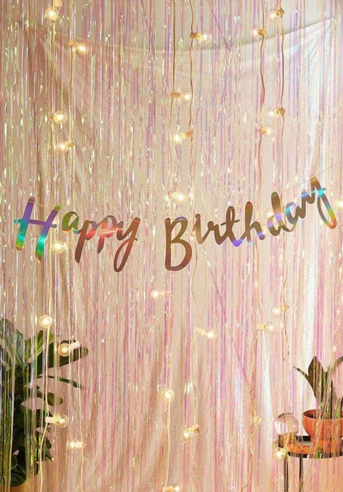 happy birthday banner, 18th birthday party ideas, strings of lights hanging on the wall