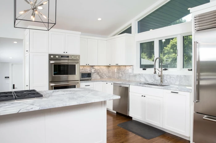 white cabinets with marble countertops, modern kitchen cabinets colors, laminated wooden flooring