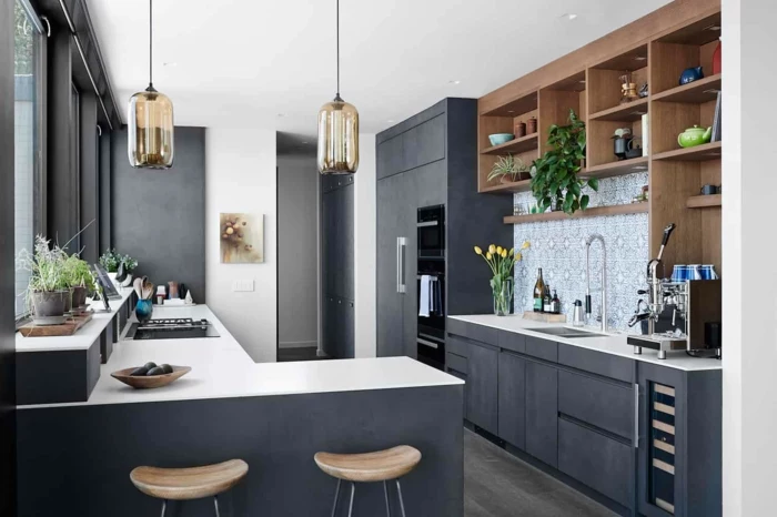 black cabinets with white countertops, mid century modern backsplash, wooden open shelving