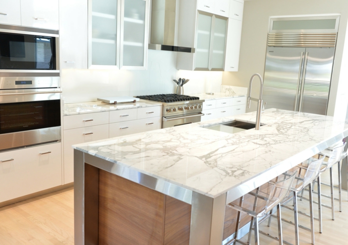 wooden kitchen island, marble countertops, mid century modern kitchen island, white cabinets