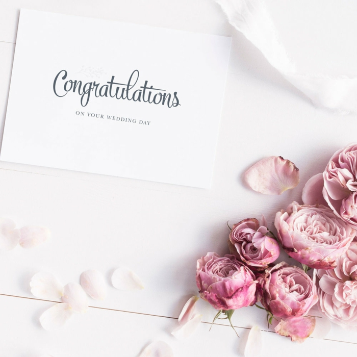 minimalistic wedding card, white card stock, wedding wishes for a friend, pink peonies next to it