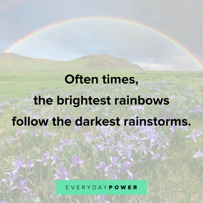 background photo of mountain landscape with rainbow, quotes about getting through tough times, written with black letters
