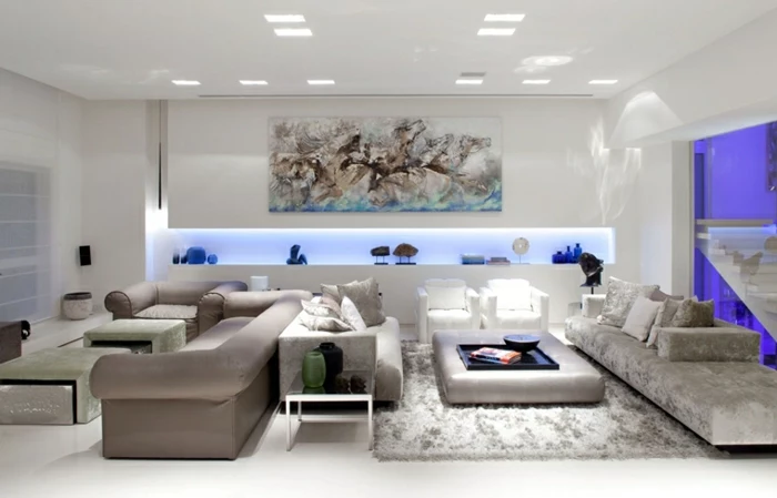 grey sofas, white tiled floor with grey carpet, living room setup ideas, white walls