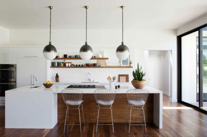 wooden kitchen island, white countertops, mid century kitchen island, open shelving, white backsplash