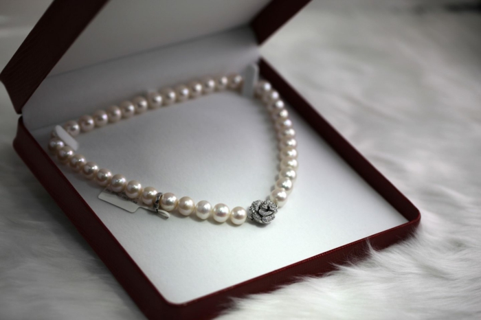 pearl necklace, rhinestone rose in the middle, anniversary gift for husband, inside a black jewelry box