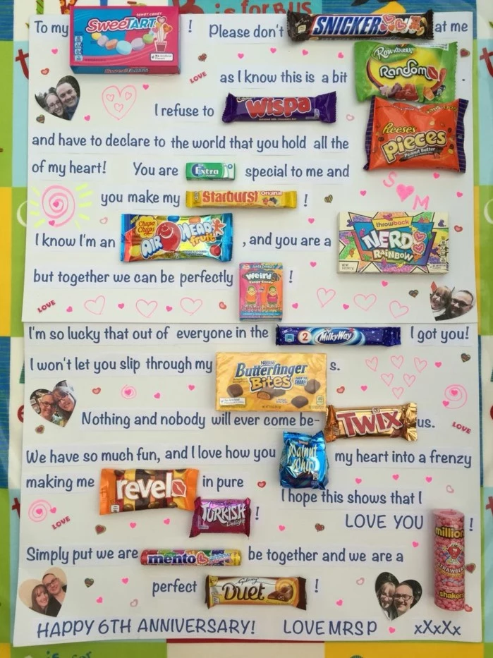 poster with long message, written with candy bars, traditional anniversary gifts, photos glued on it