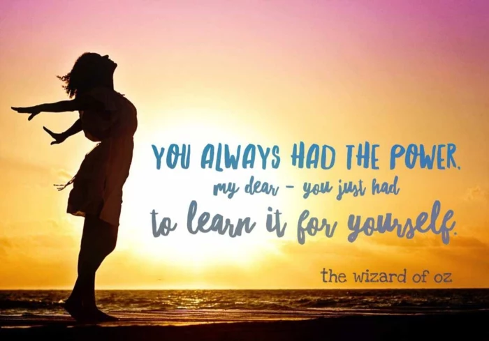 quote from the wizard of oz, positive hopes quote, written with blue letters, background photo of woman at sunset