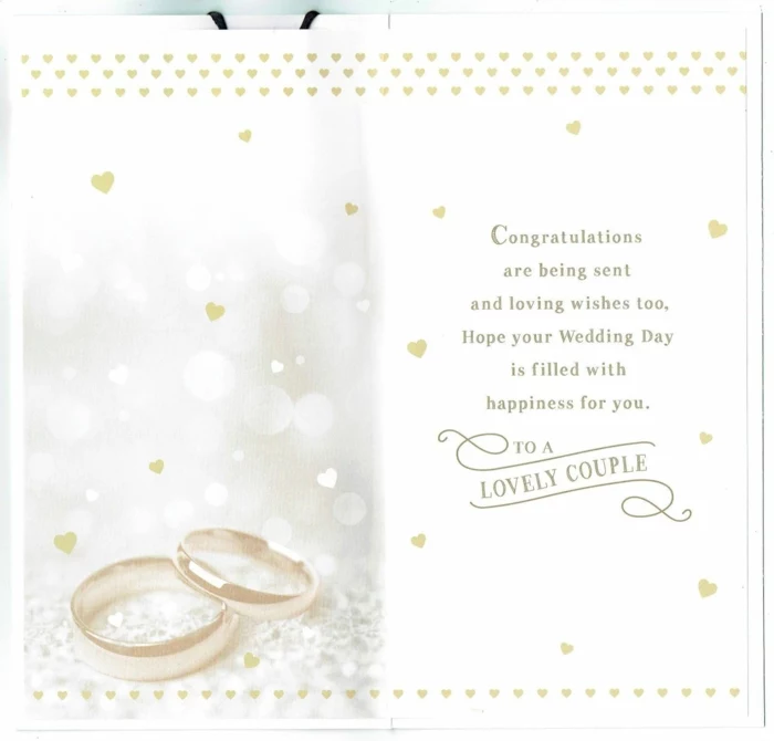 white card stock, what message to write in a wedding card, photo of wedding bands at the front