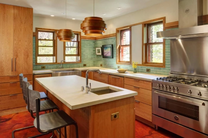 wooden cabinets with white countertops, mid century modern backsplash tile, light green tiles backsplash