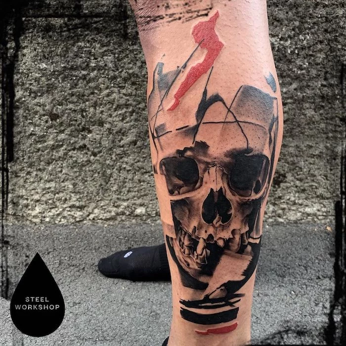 abstract skull surrounded by red black lines trash polka tattoo design leg tattoo