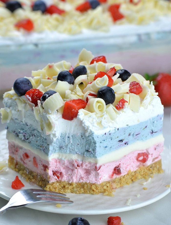 berry lasagna summer dessert recipes layered with blue pink and white layers blueberries strawberries and white chocolate on top