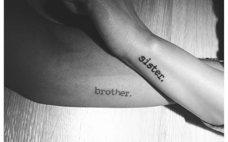 black and white photo sibling tattoos for 3 brother sister tattooed on the side of the arm