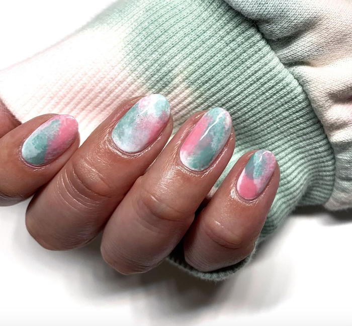 white nail polish, pink and green smudges decorations, nail design ideas, short squoval nails