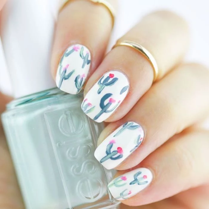 white nail polish, cactuses drawings decorations, summer nail designs, medium length squoval nails