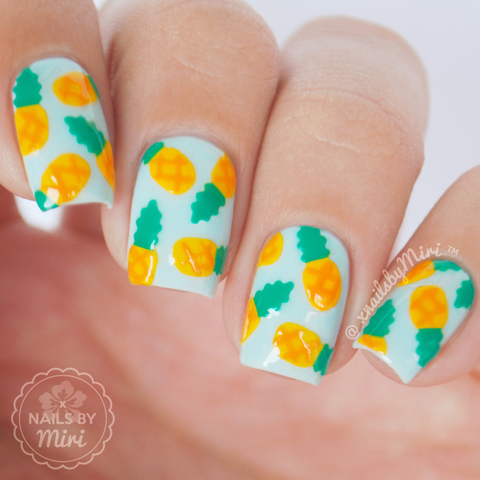 blue nail polish, short square nails, pineapples decorations, nail design ideas