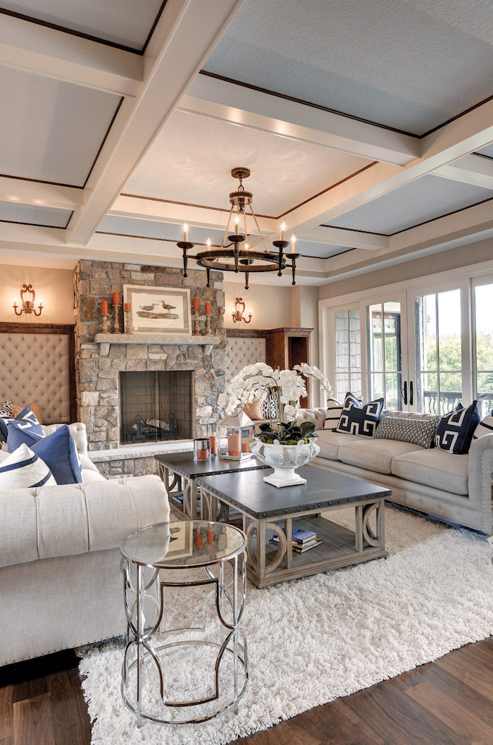 white furniture set, placed in front of a fireplace, modern farmhouse decor, white carpet on wooden floor