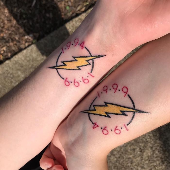 brother sister tattoos symbol of the flash dc character with two years written around it wrist tattoos