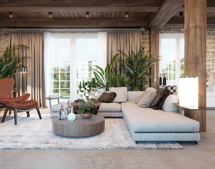 white corner sofa, farmhouse decor ideas, round wooden coffee table, brown leather armchair, white carpet on granite floor