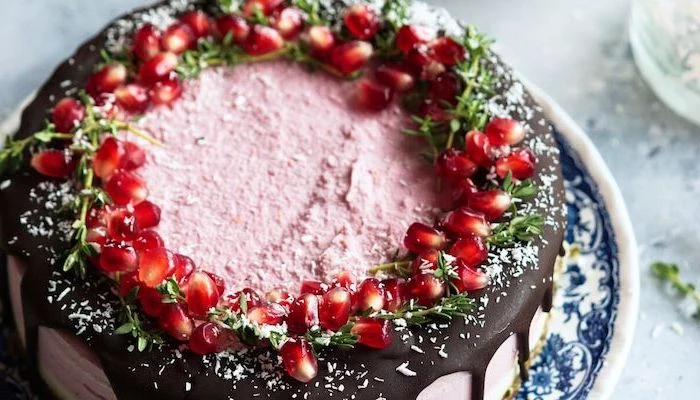 cake decorated with chocolate coconut flakes pomegranate seeds easy summer desserts