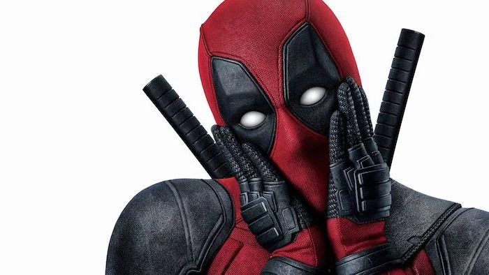 close up photo of deadpool in full costume holding his face on white background funny wallpapers