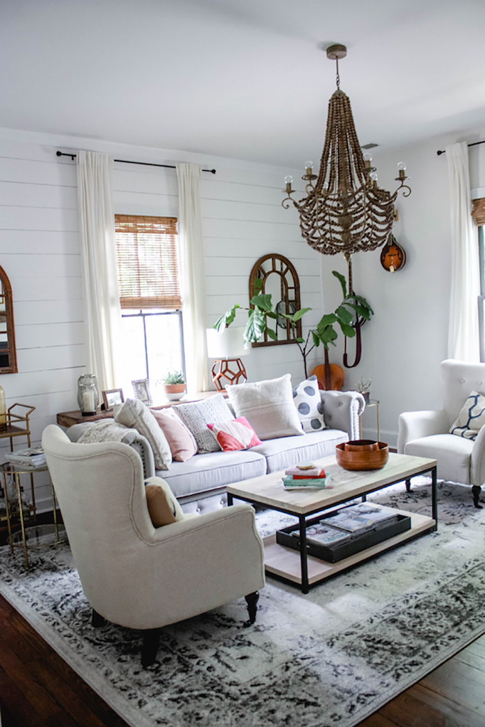 white furniture set, sofa with two armchairs, wooden coffee table, rustic home decor, white carpet on wooden floor