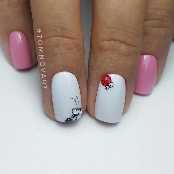 white and pink nail polish, ladybug decorations, cute nail colors, short squoval nails, white background