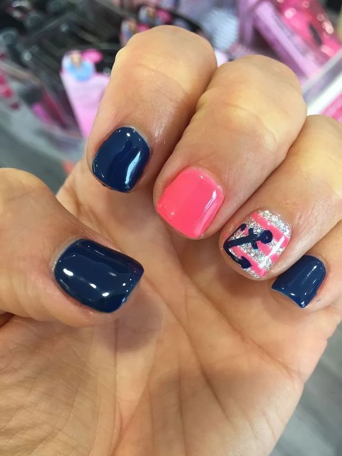 dark blue and pink nail polish, cute summer nails, short squoval nails, anchors decorations