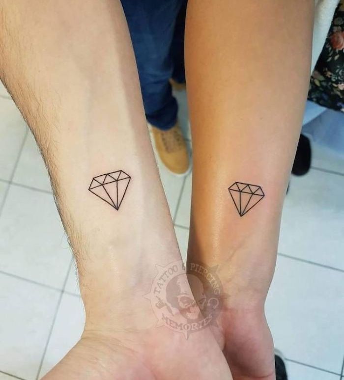diamonds outlines brother and sister tattoos small matching forearm tattoos white tiled floor in the background