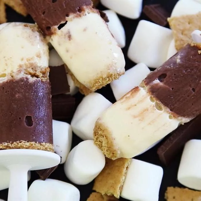 easy no bake desserts popsicles with chocolate smores and crackers frozen smores underneath them