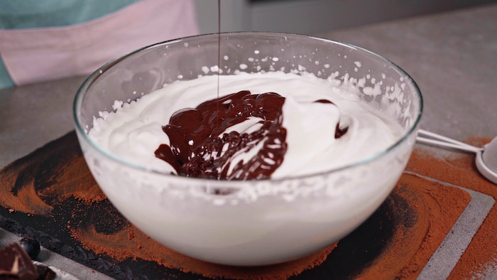 easy party desserts whipped aquafaba with sugar mixed with melted chocolate inside glass bowl