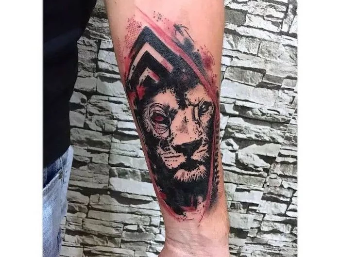forearm tattoo of lion head trash polka tattoo style surrounded by red black strokes and lines
