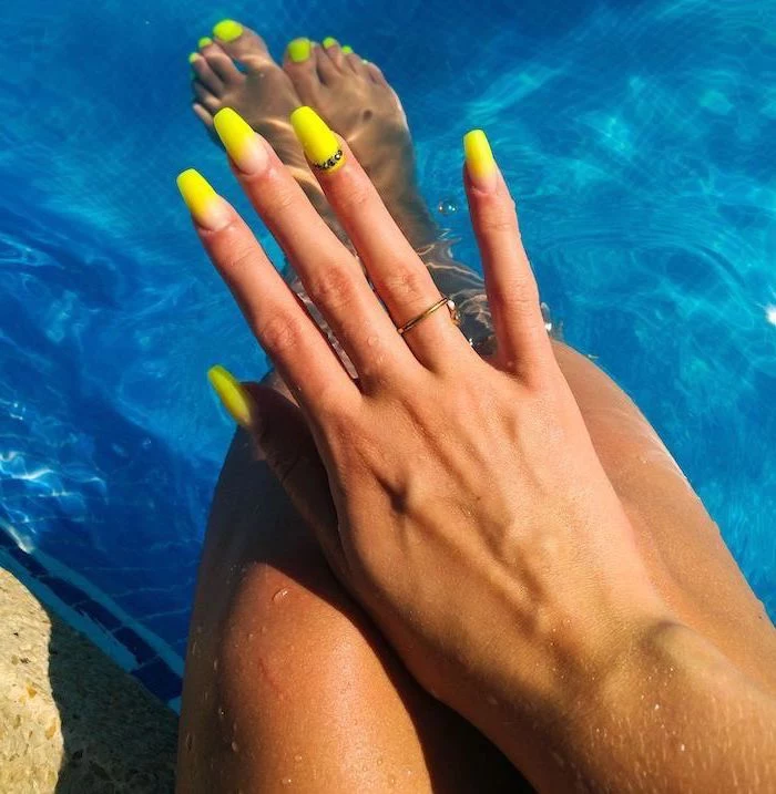 yellow and nude nail polish, ombre nails, cute nail designs, decorations with rhinestones, long coffin nails