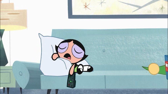 funny wallpapers buttercup from powerpuff girl laying on the sofa holding a remote falling asleep