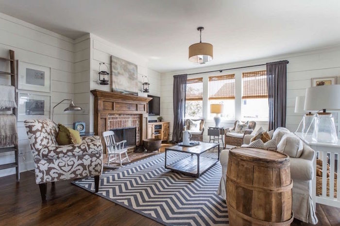 white furniture set, placed in front of a fireplace, farmhouse style homes, grey and white chevron carpet