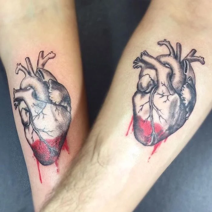 hearts in black and red sibling tattoos for 3 matching forearm tattoos grey background