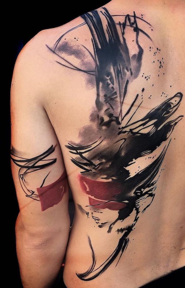 large back tattoo trash polka tattoo style black and red lines and strokes going to the arm