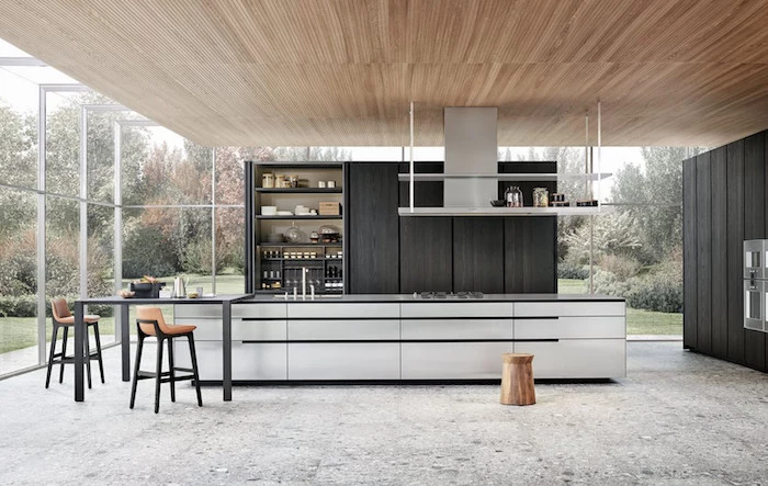 long kitchen island in black and white, tall black bar stools, modern kitchen, dark wooden cabinets, open shelving, granite floor