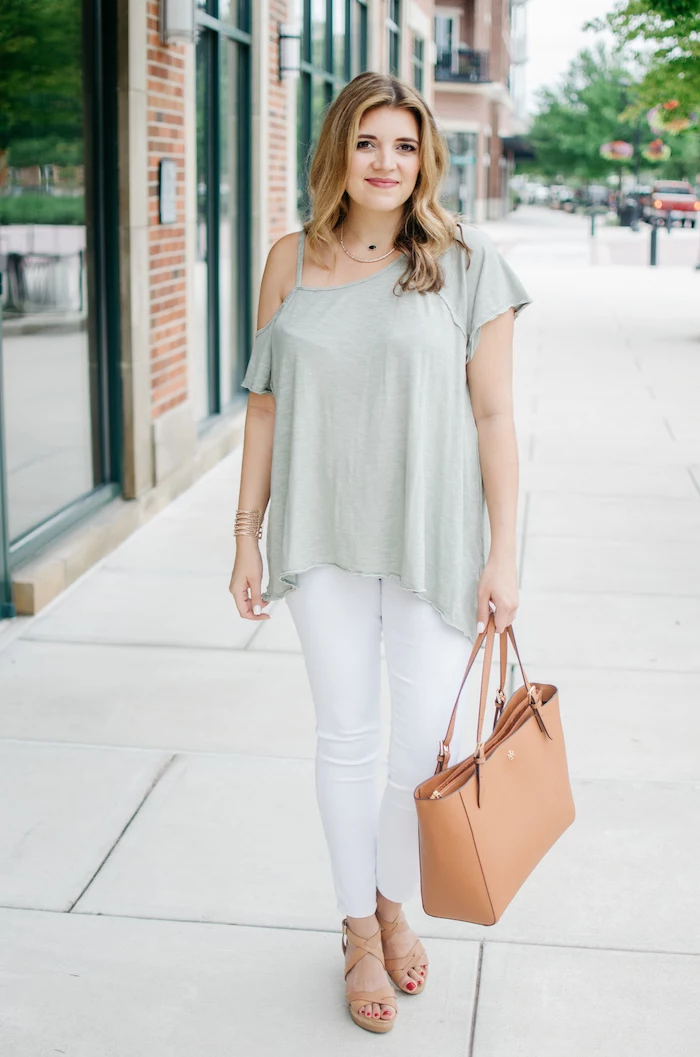 light green top white jeans worn by blonde woman cute simple outfits brown leather bag and sandals