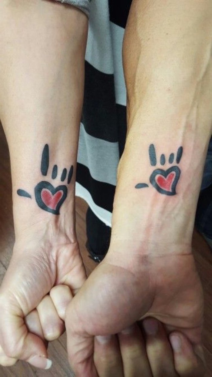 matching wrist tattoos brother sister tattoo ideas hand prints with palm in the shape of hearts