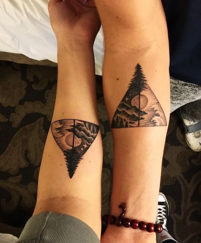mountain landscape with lake and forest during day an night brother and sister matching tattoos forearm tattoos