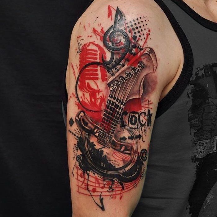 musical themed tattoo trash polka sleeve guitar microphone notes rock written on it shoulder tattoo