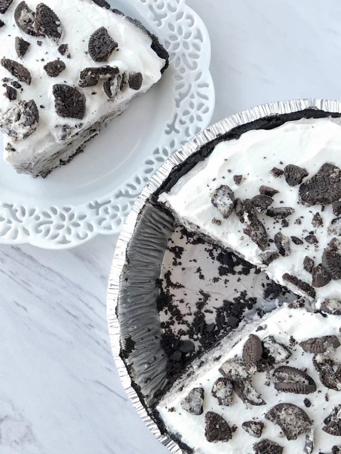 oreo pudding pie with three layers best summer desserts placed on white wooden surface